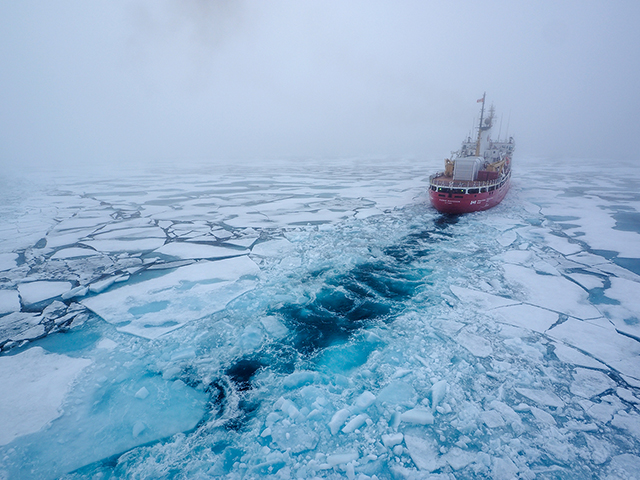 Canadian icebreaker Pierre Radisson, assisting us through ice near BellotnStraits in the Canada Archipelago  Olympus E-M1 9-18mm lens