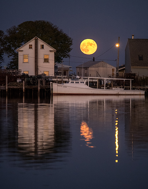 View of "Blood Moon" rising above Tylerton on Smith Island