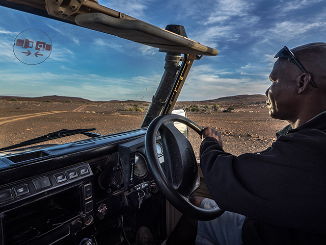 Our guide, Ally, driving in Rhino Camp Oly E-M1  9-18mm