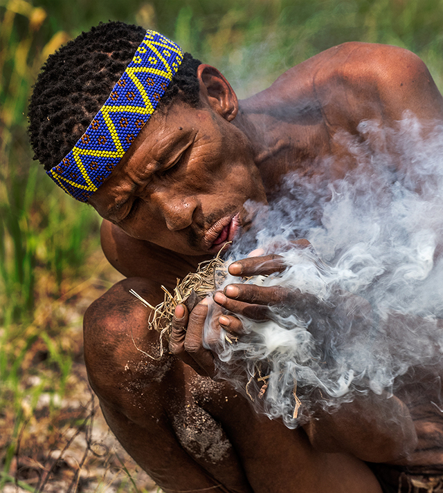 Ju-hoan hunter gatherer starting fire Oly E-M1  40-150mm f2.8