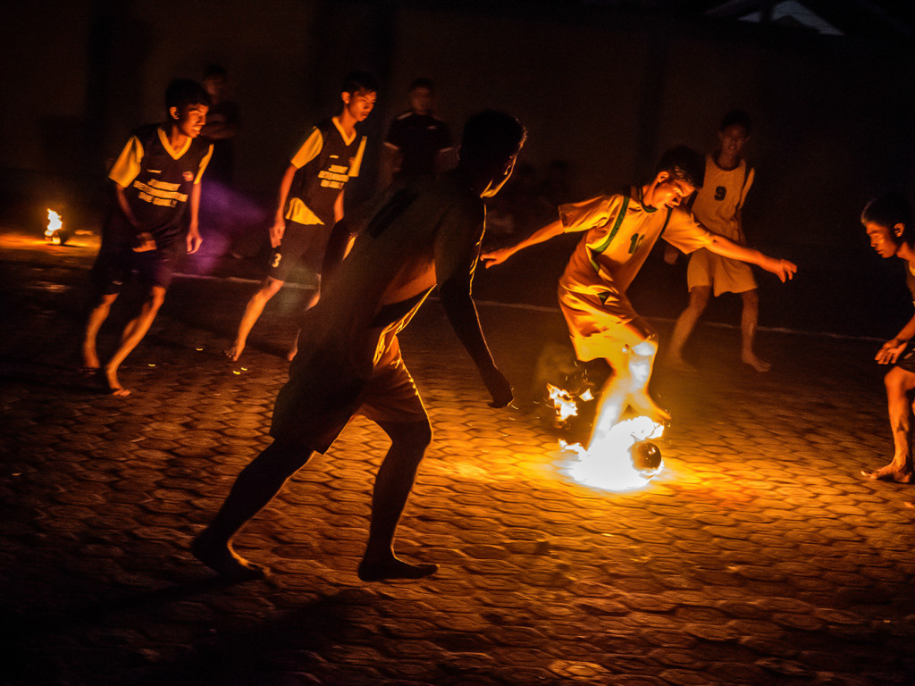 fire soccer, played with a flaming ball at night, Borneo  E-M1 12-40mm