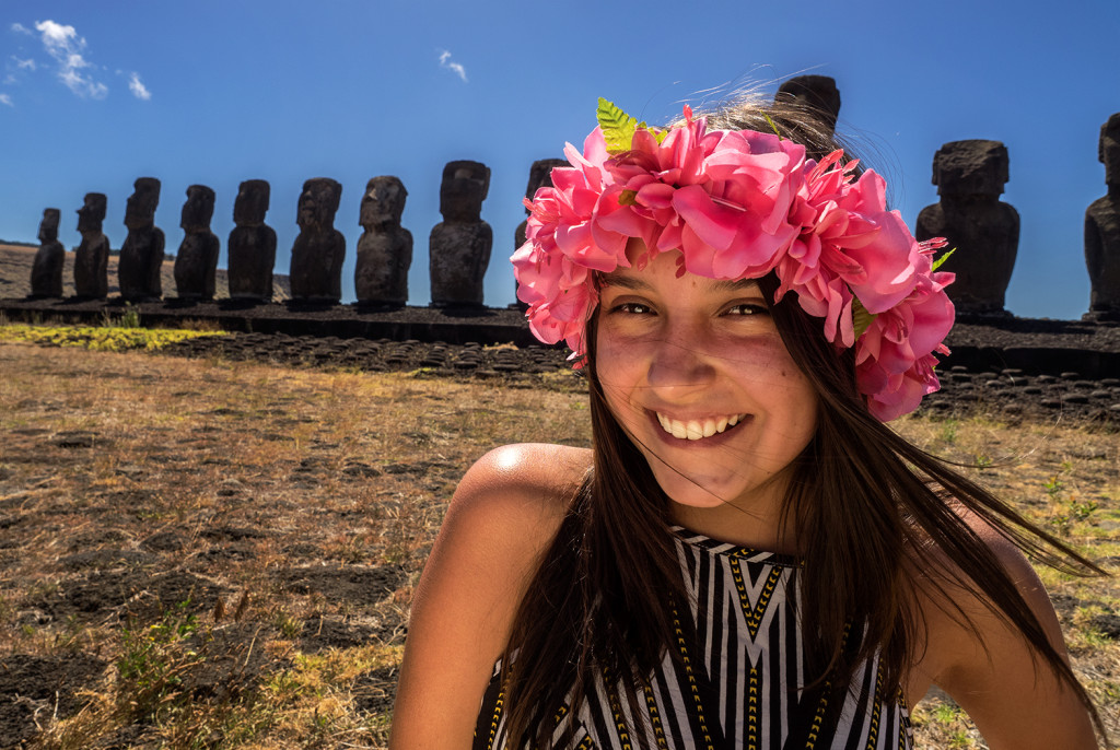 Young woman at Ahu Tongariki on Easter Island with Moai behind her E-M1 12-40mm