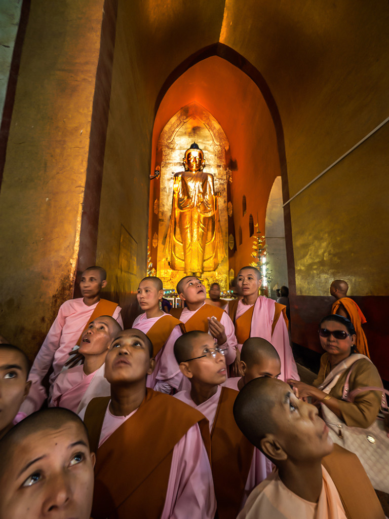 Young monks gaze at interior of XXXX Temple in Bagan region of Myanmar E-M1 7-14mm Pro lens
