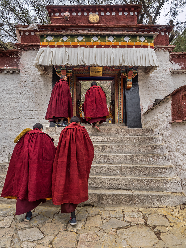 Sera Monastery in Lhasa, Tibet-monks head into debating session
