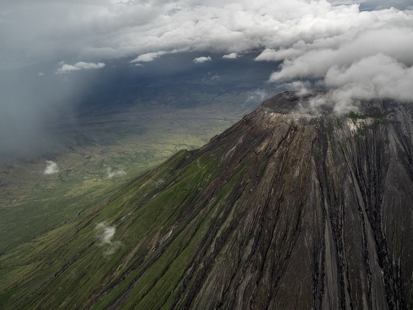 Near Arusha, Tanzania, the active volcano, Ol Doinyo Lengai, "Mountain of God" in the Maasai language
