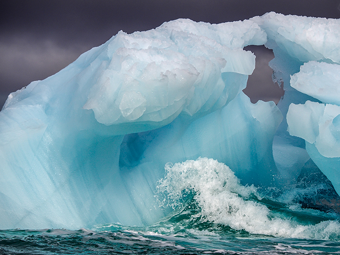 Wave breaking in front of iceberg, Canadian Archipelago 